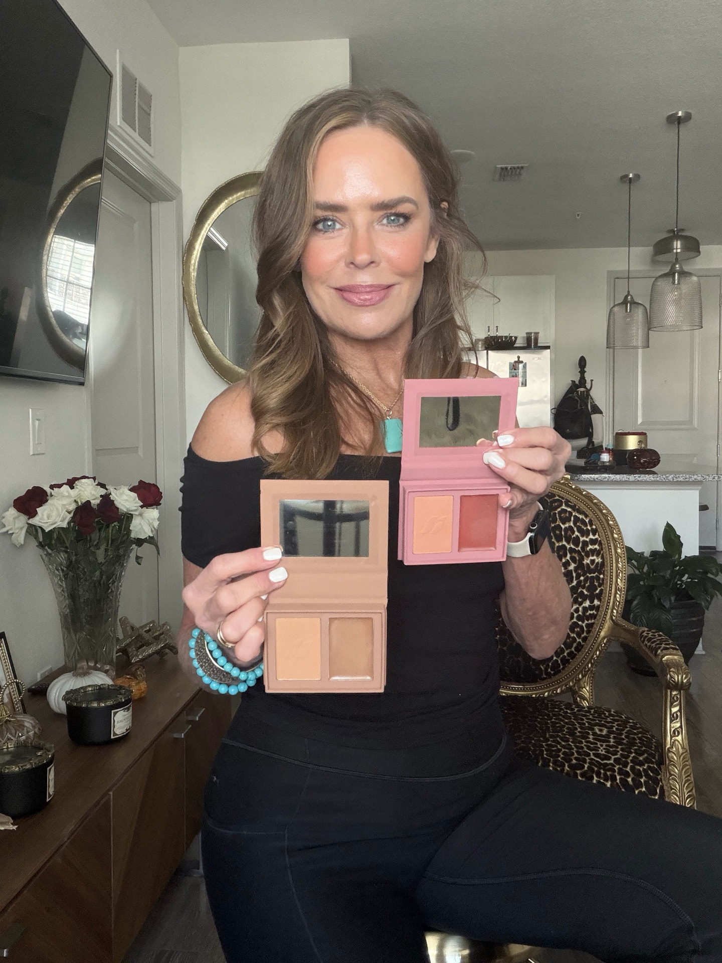 Cola Harris showing makeup palettes